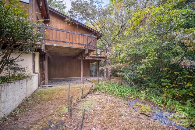 a view of empty room with wooden walls