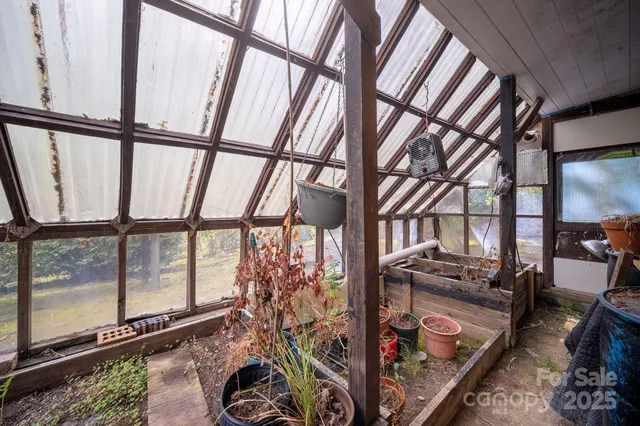 a bathroom with a shower and a sink