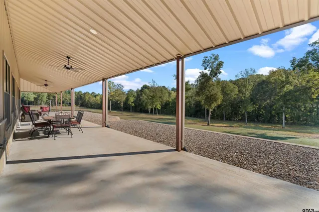 a bedroom with bed and window
