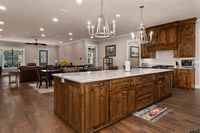 a workspace with furniture and a book shelf