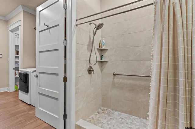 a bedroom with furniture and a window