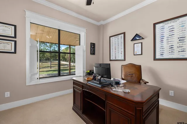 a bed room with furniture and a flat screen tv