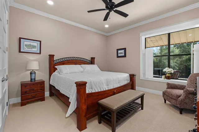 a view of a livingroom with furniture and a chandelier