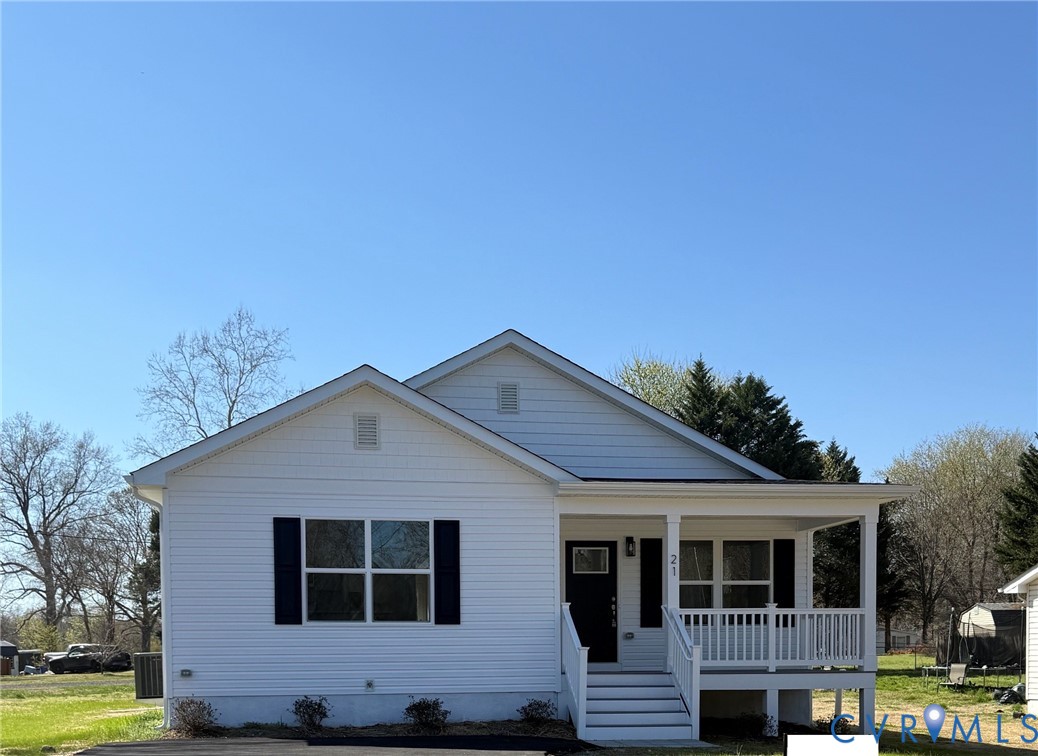a front view of a house with yard