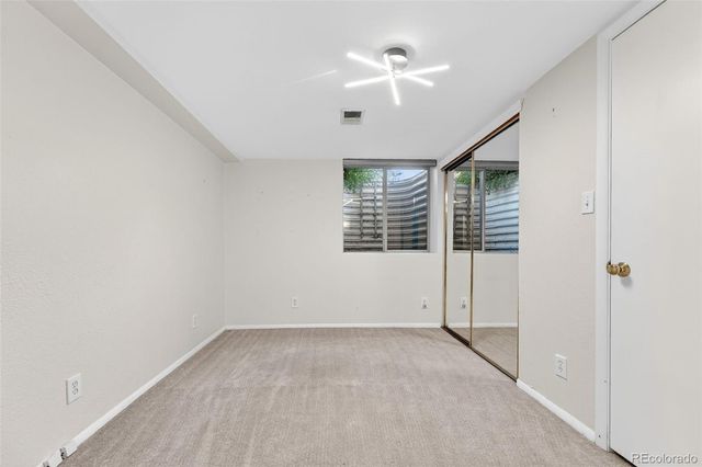 en empty room with windows