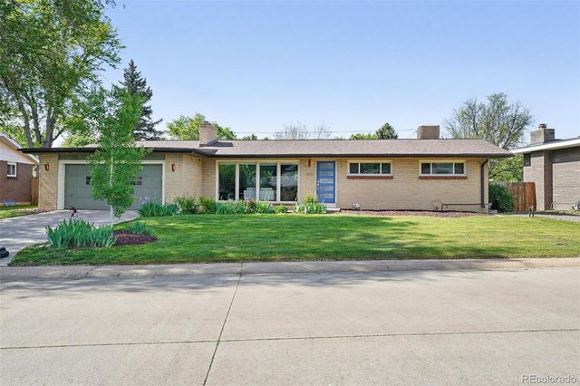 a house view with a garden space