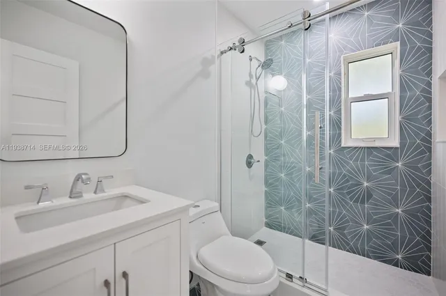 a view of a backyard of the house