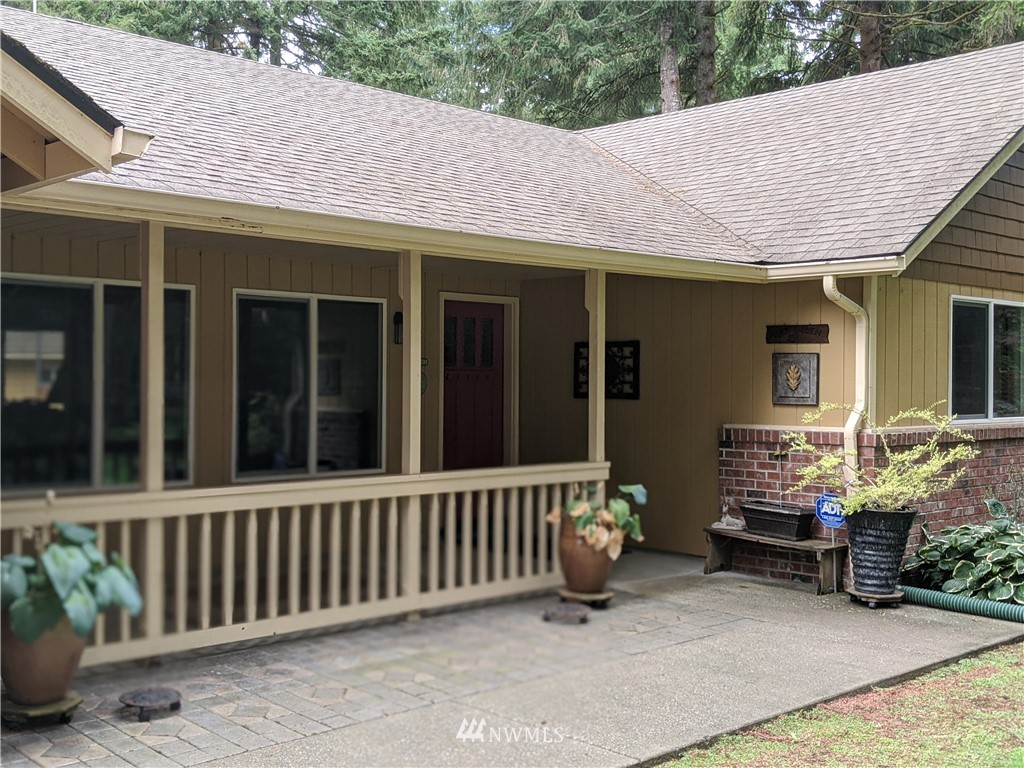 5428 133rd Avenue Southwest Rochester, WA 98579 - Photo 12 of 21 a view of a house with a yard