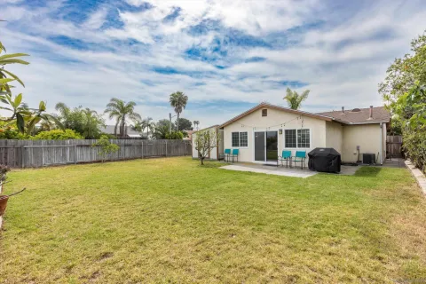 a front view of house with yard having swimming pool