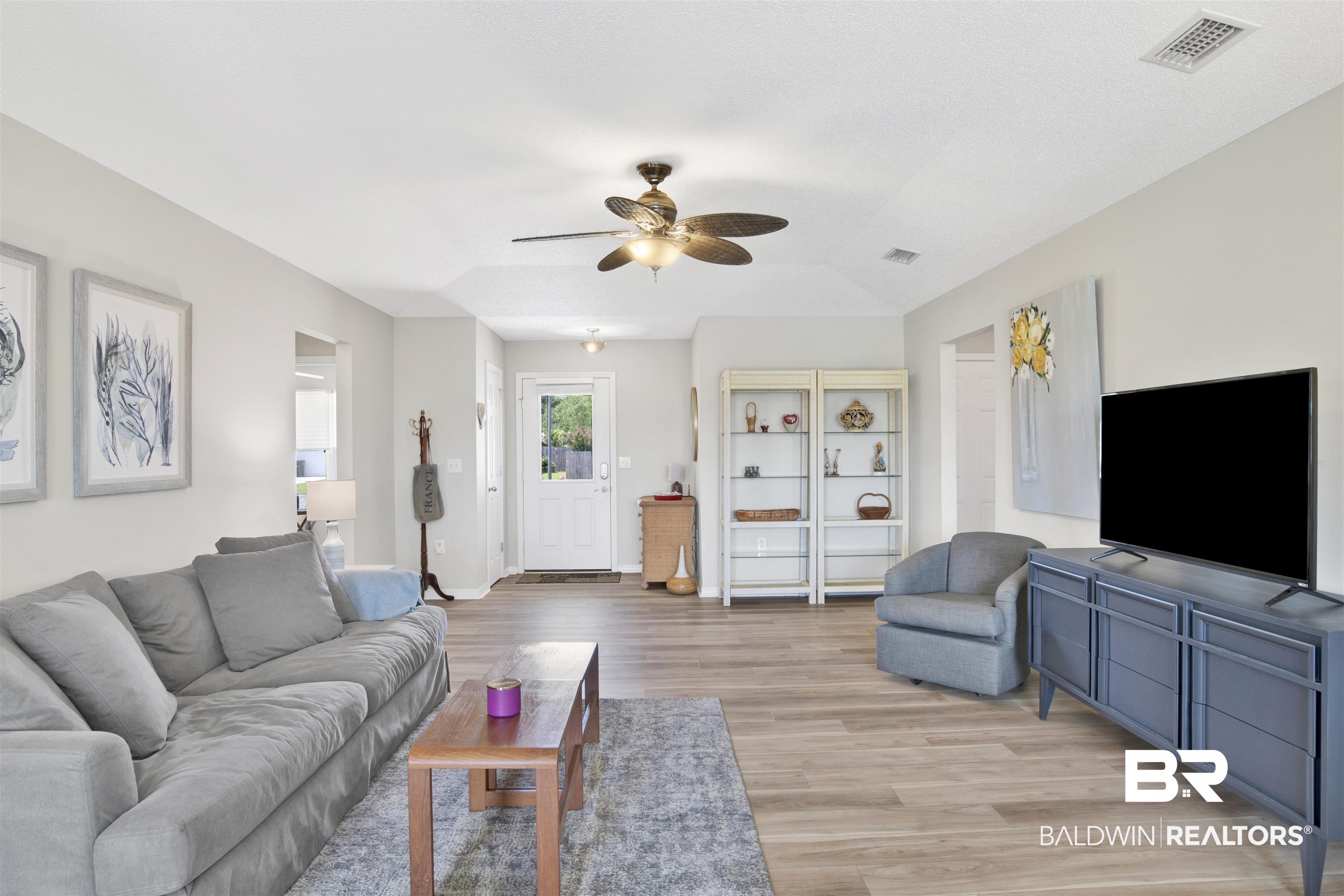 1044 Amazon Drive Foley, AL 36535 - Photo 4 of 29 Living room with hardwood / wood-style flooring and ceiling fan