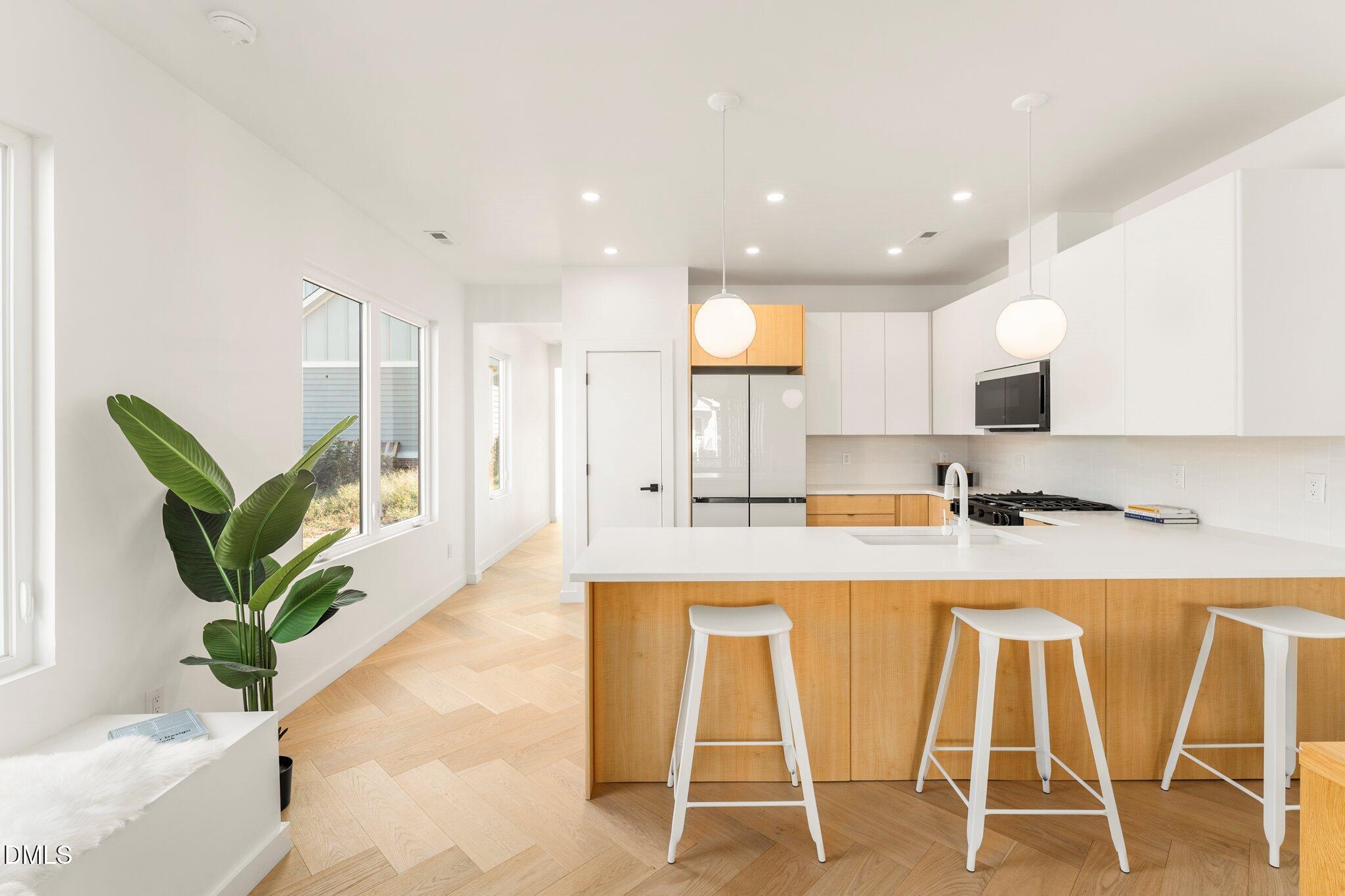 409 Alston Street, Unit 101 Raleigh, NC 27601 - Photo 1 of 39 Sleek modern finished throughout