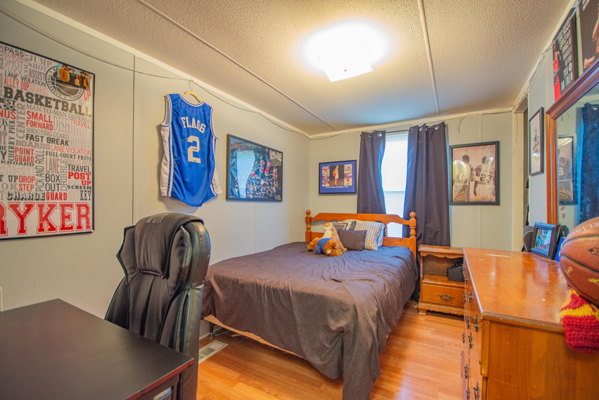 2490 Tackets Branch Road Prospect, TN 38477 - Photo 14 of 42 a bedroom with furniture and wooden floor