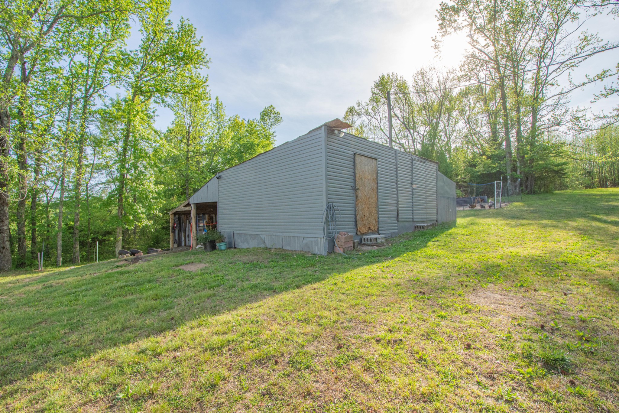 2490 Tackets Branch Road Prospect, TN 38477 - Photo 19 of 42 a backyard of a house with swimming pool and green space