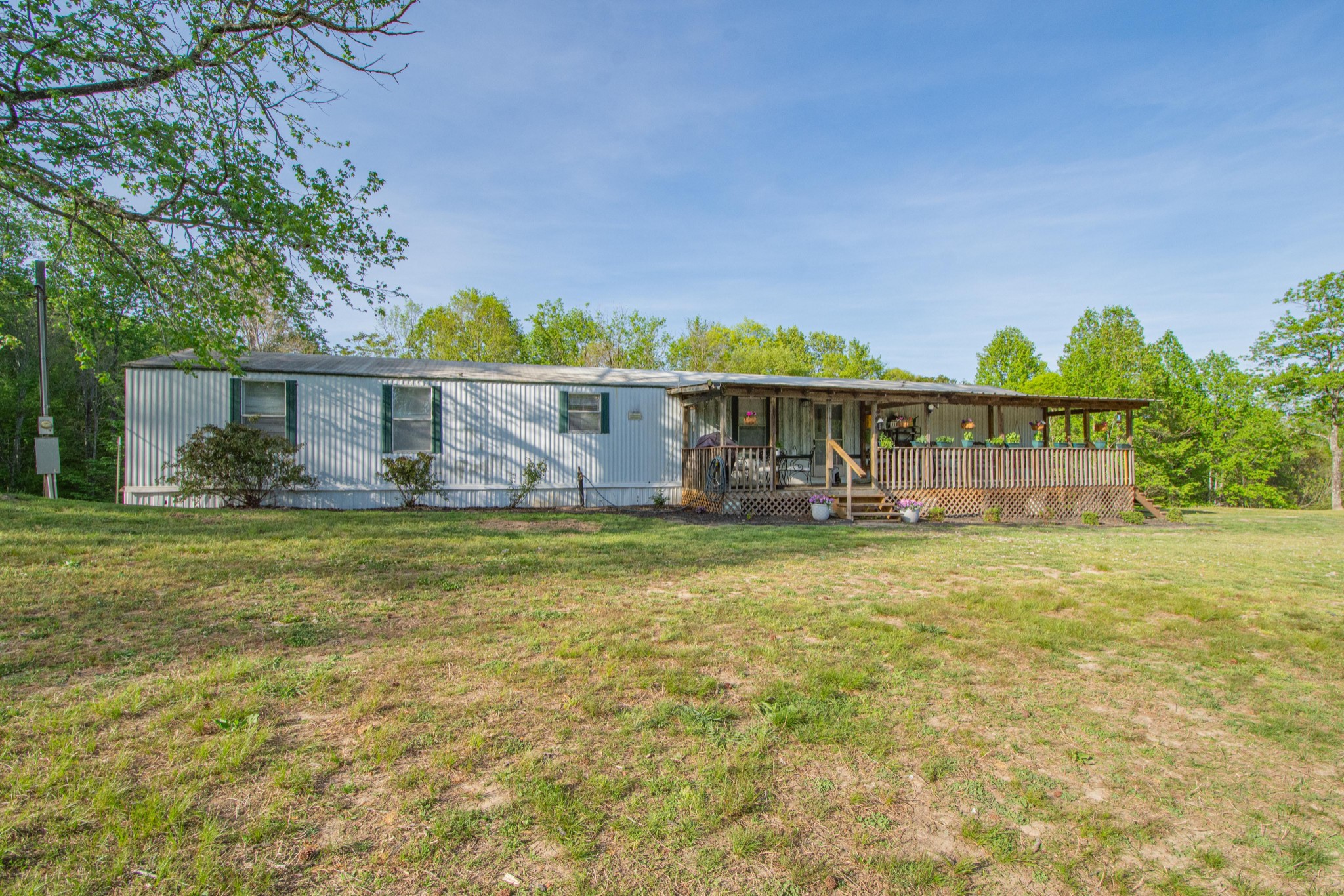 2490 Tackets Branch Road Prospect, TN 38477 - Photo 2 of 42 a view of a house with a yard and a garden