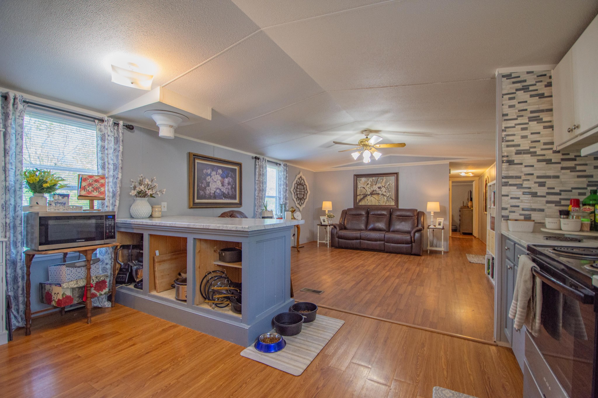 2490 Tackets Branch Road Prospect, TN 38477 - Photo 9 of 42 a living room with furniture and a fireplace