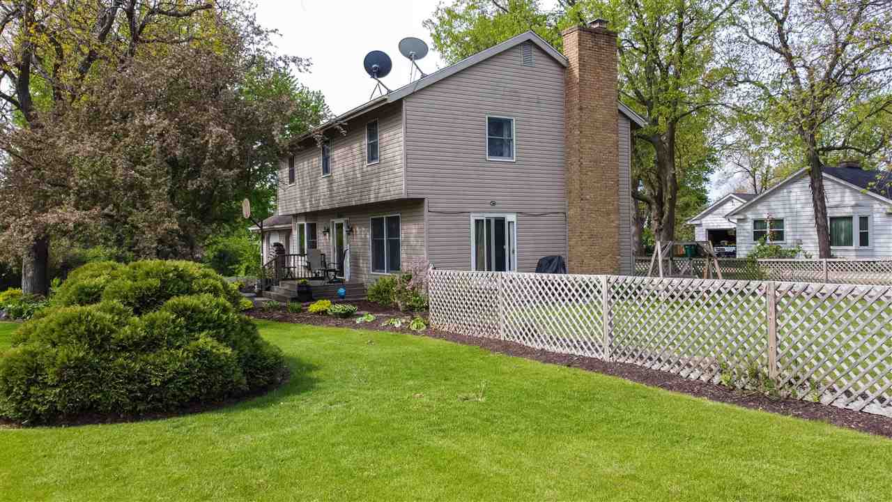 8488 Grange Hall Road Garden Prairie, IL 61038 - Photo 30 of 35 a front view of a house with a yard