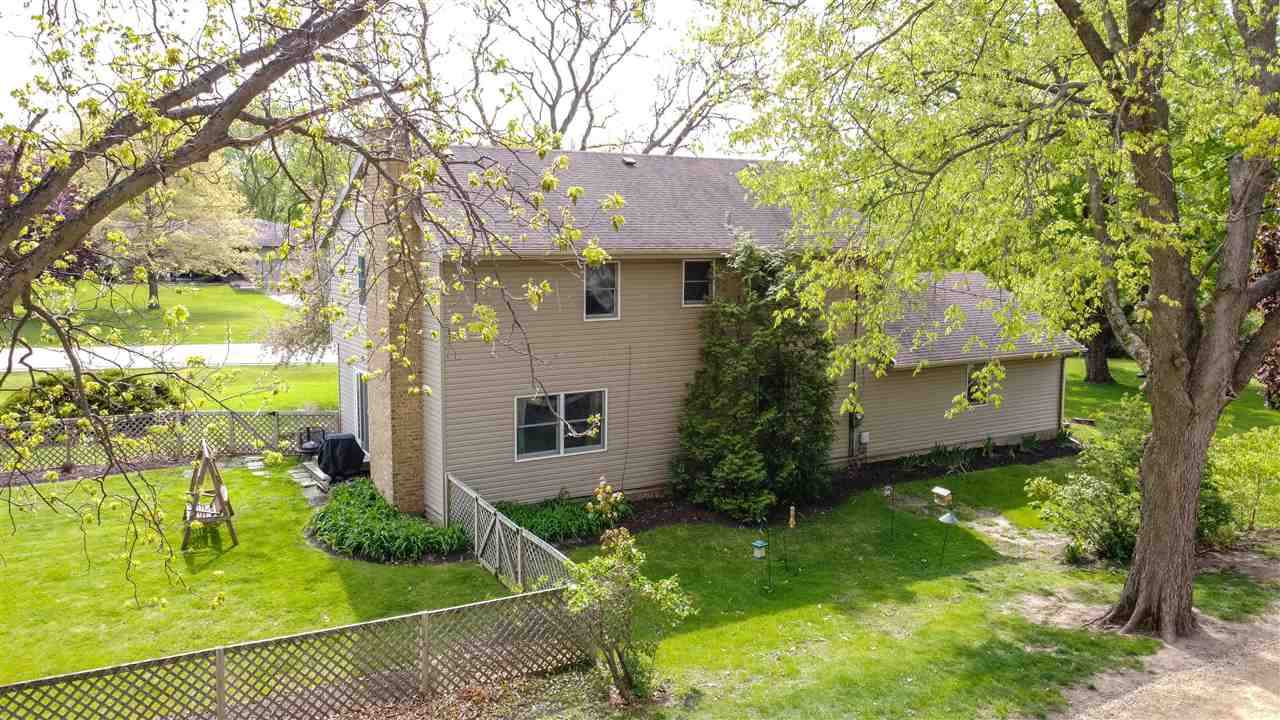 8488 Grange Hall Road Garden Prairie, IL 61038 - Photo 32 of 35 a view of a house with a yard