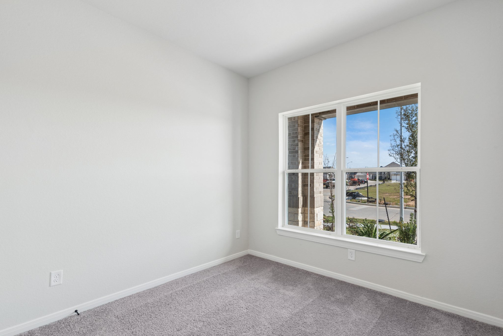 26502 Delightful Drive Hockley, TX 77447 - Photo 12 of 50 an empty room with windows