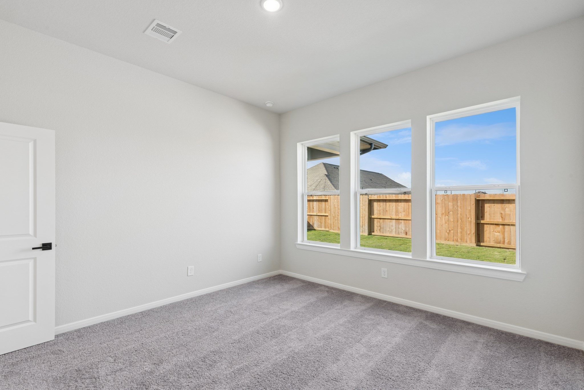 26502 Delightful Drive Hockley, TX 77447 - Photo 25 of 50 an empty room with windows