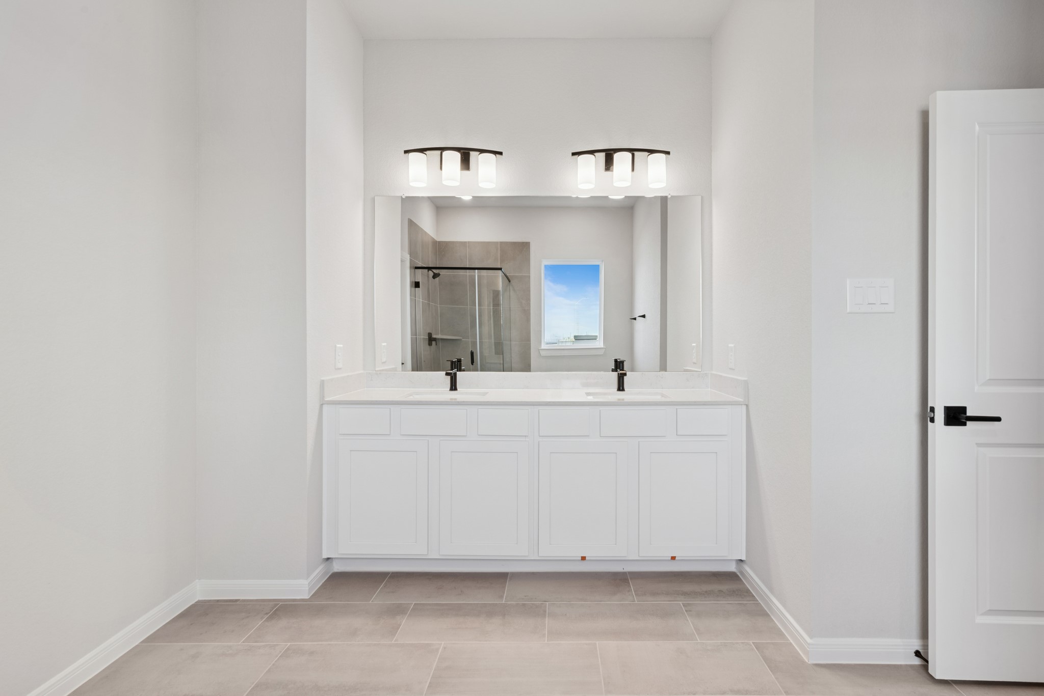26502 Delightful Drive Hockley, TX 77447 - Photo 29 of 50 a bathroom with a sink and a mirror