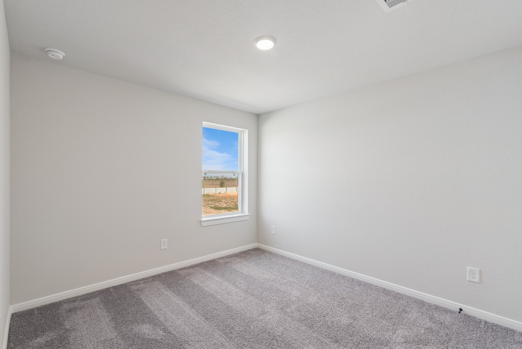 26502 Delightful Drive Hockley, TX 77447 - Photo 33 of 50 an empty room with a window