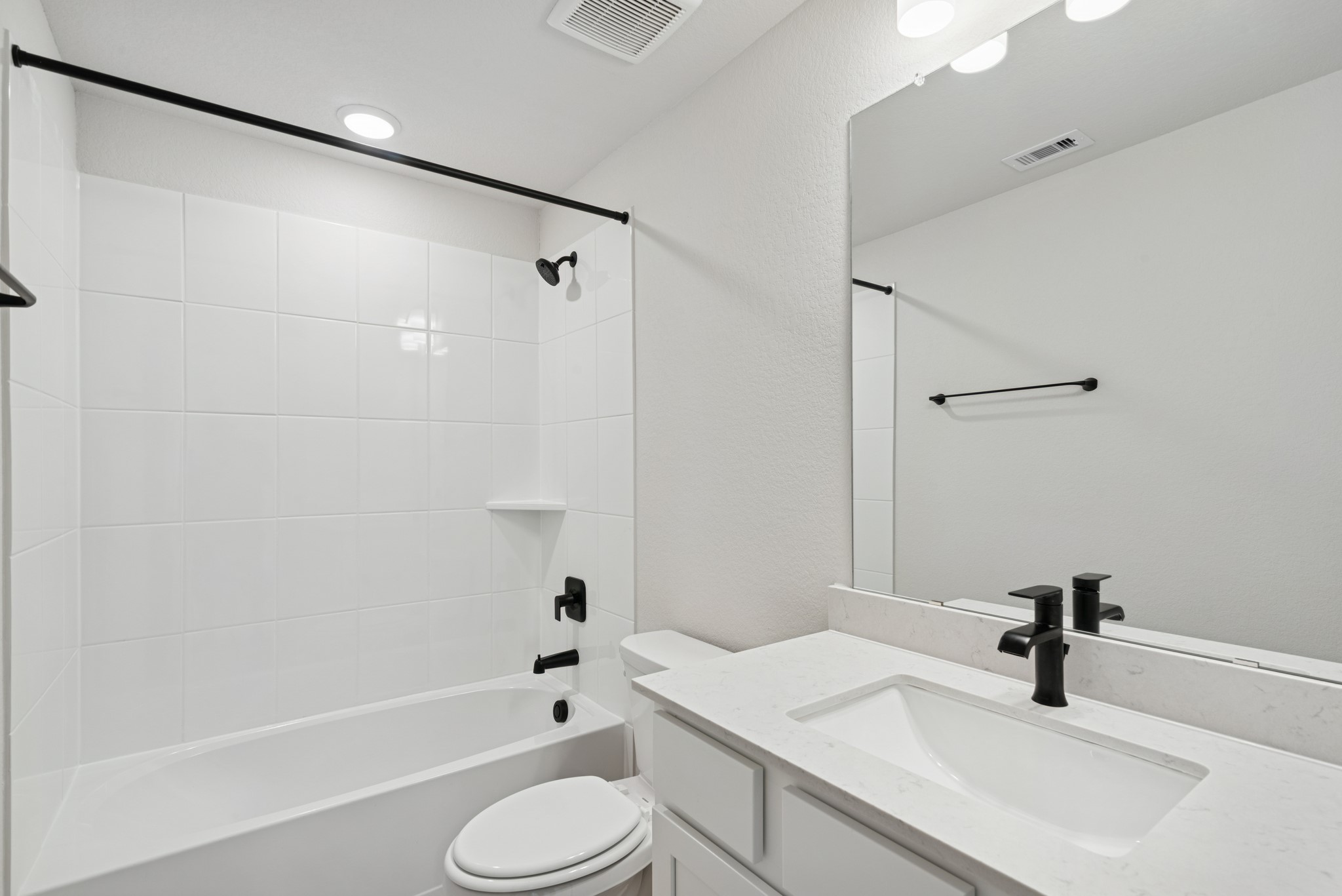 26502 Delightful Drive Hockley, TX 77447 - Photo 36 of 50 a bathroom with a sink toilet and shower