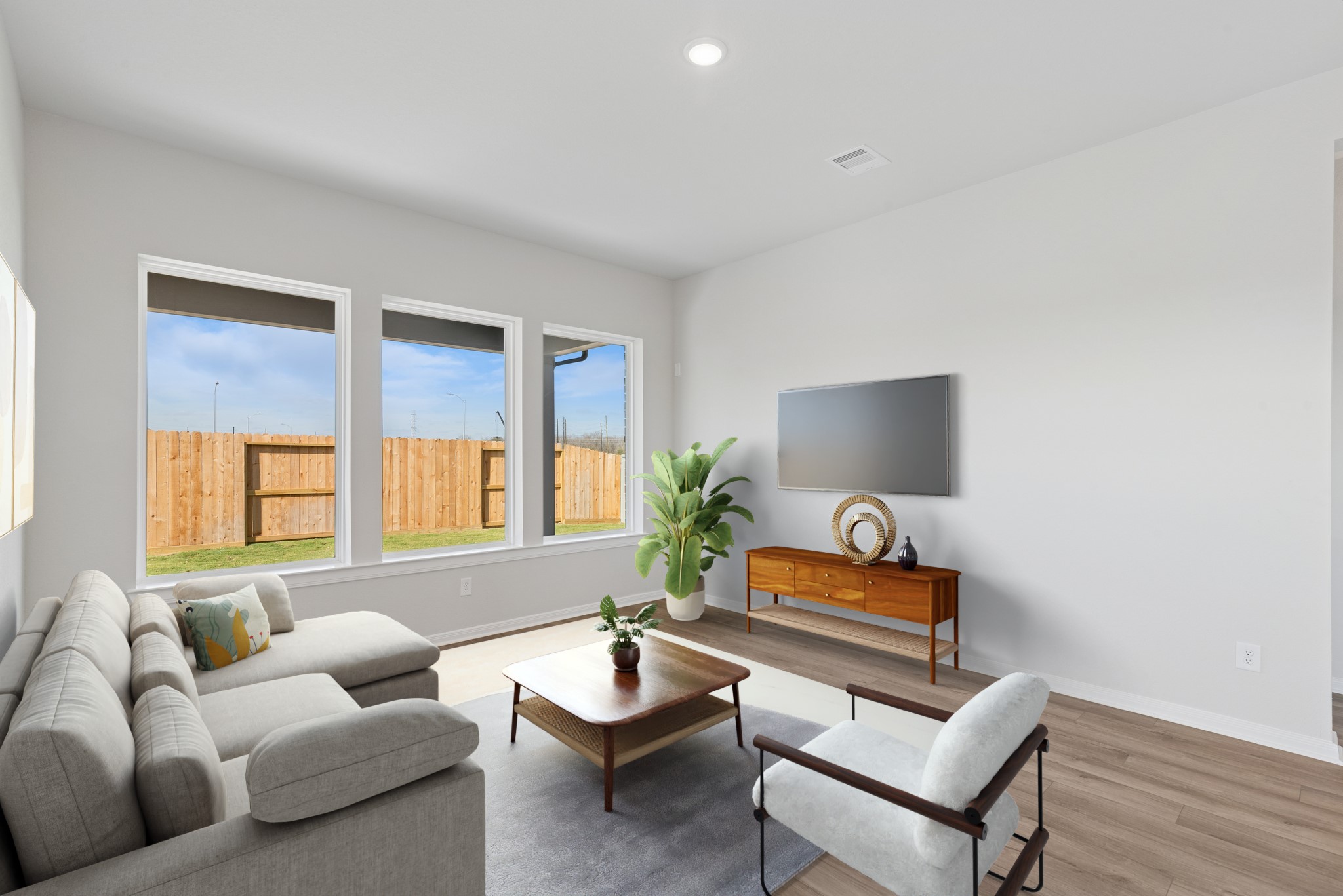 26502 Delightful Drive Hockley, TX 77447 - Photo 5 of 50 a living room with furniture and a potted plant