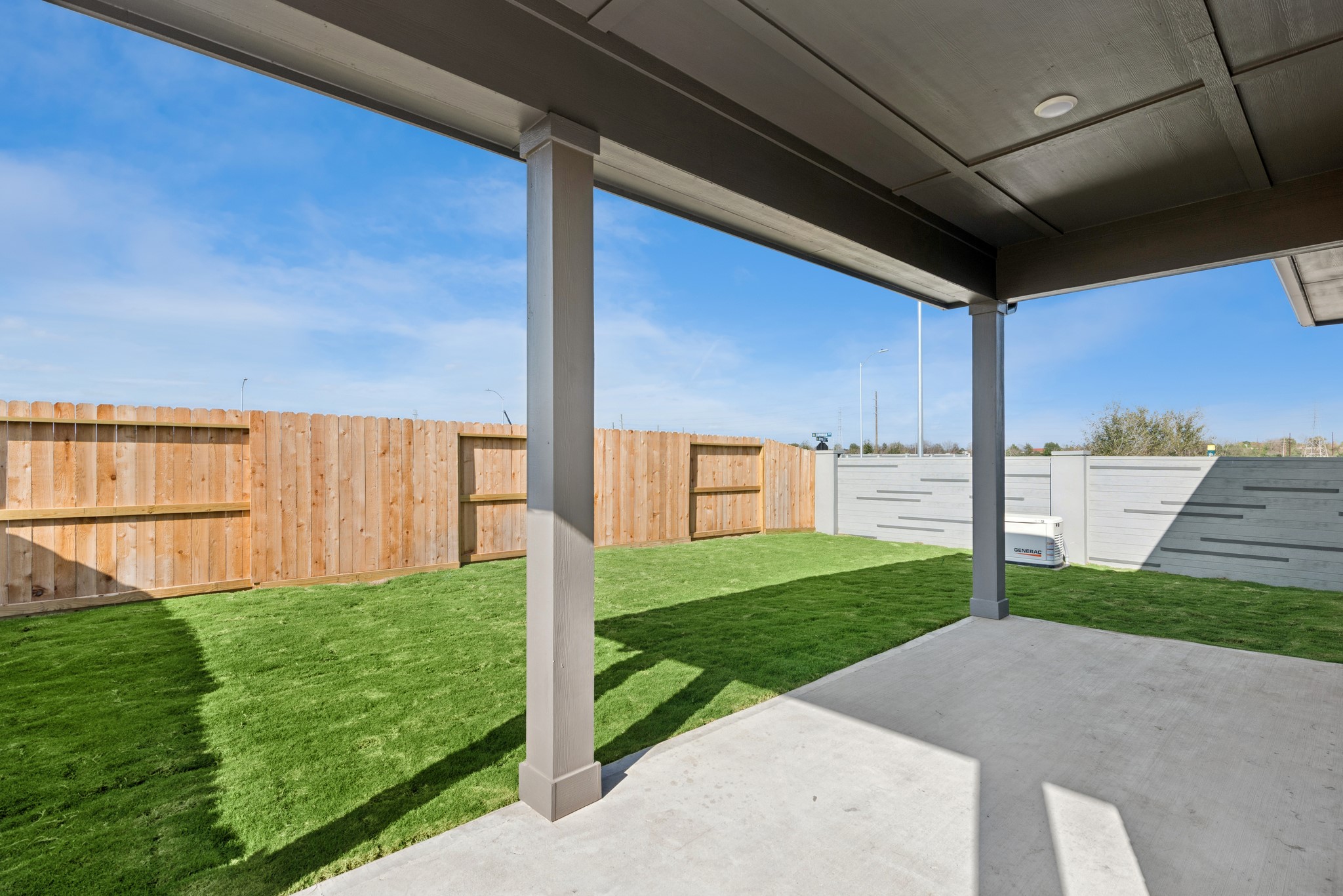 26502 Delightful Drive Hockley, TX 77447 - Photo 10 of 50 a view of a backyard with wooden fence