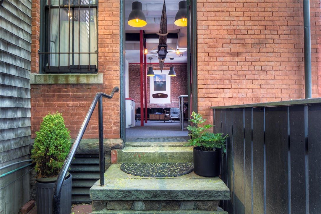 25 Mill Street Newport, RI 02840 - Photo 26 of 46 Charming entrance to the residential unit in the back of the building.