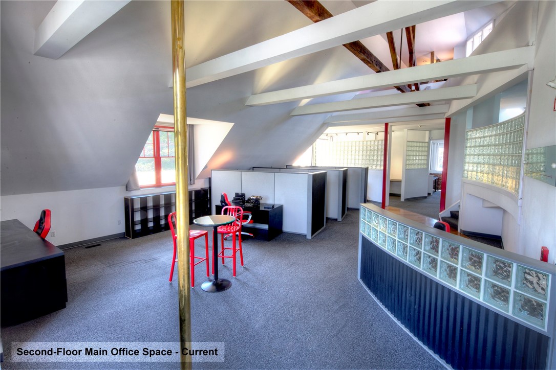 25 Mill Street Newport, RI 02840 - Photo 7 of 46 Main office space on second floor with cathedral ceilings and original wood beams.