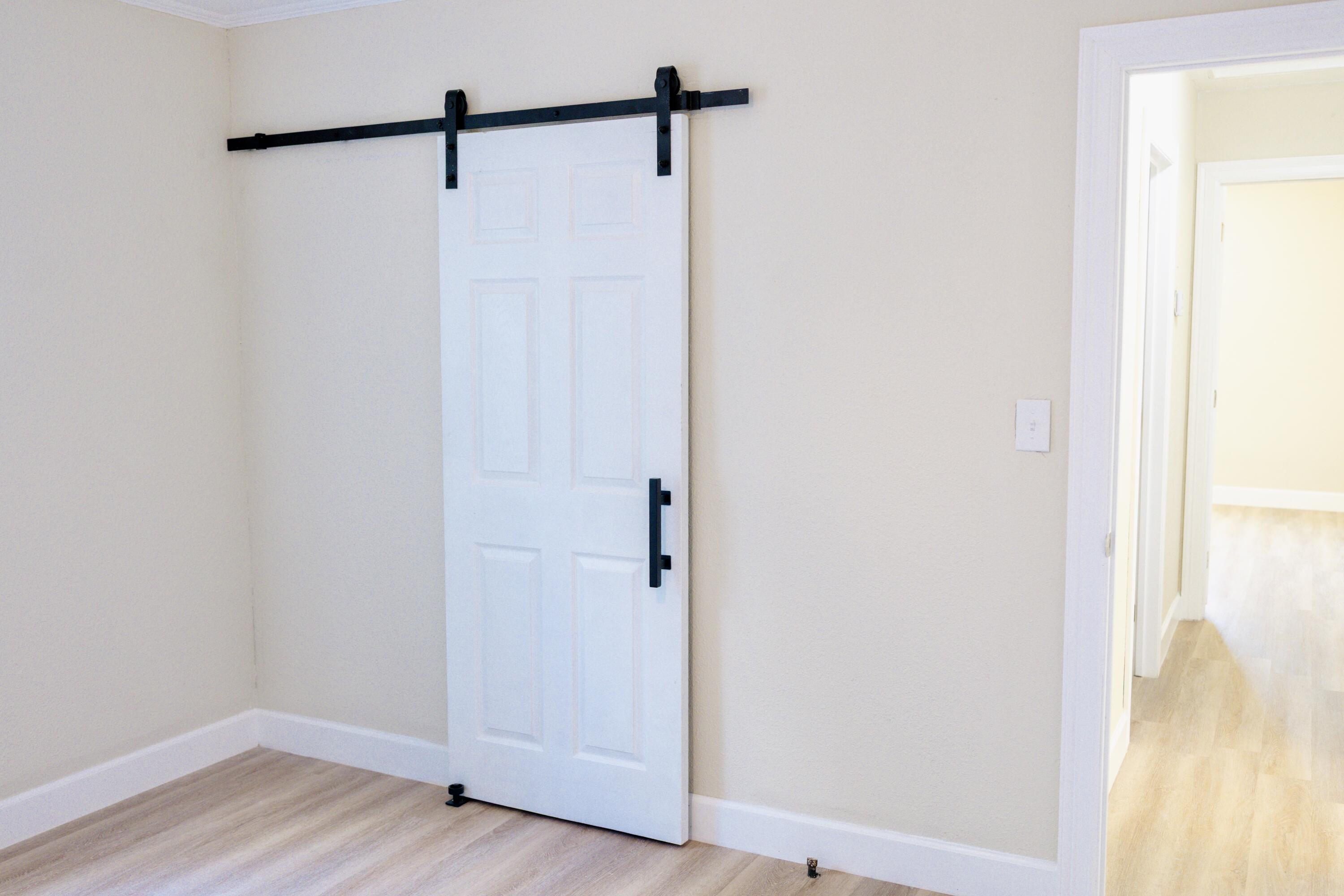 1410 West 8th Street Plainview, TX 79072 - Photo 15 of 24 a view of small space with wooden floor and a window