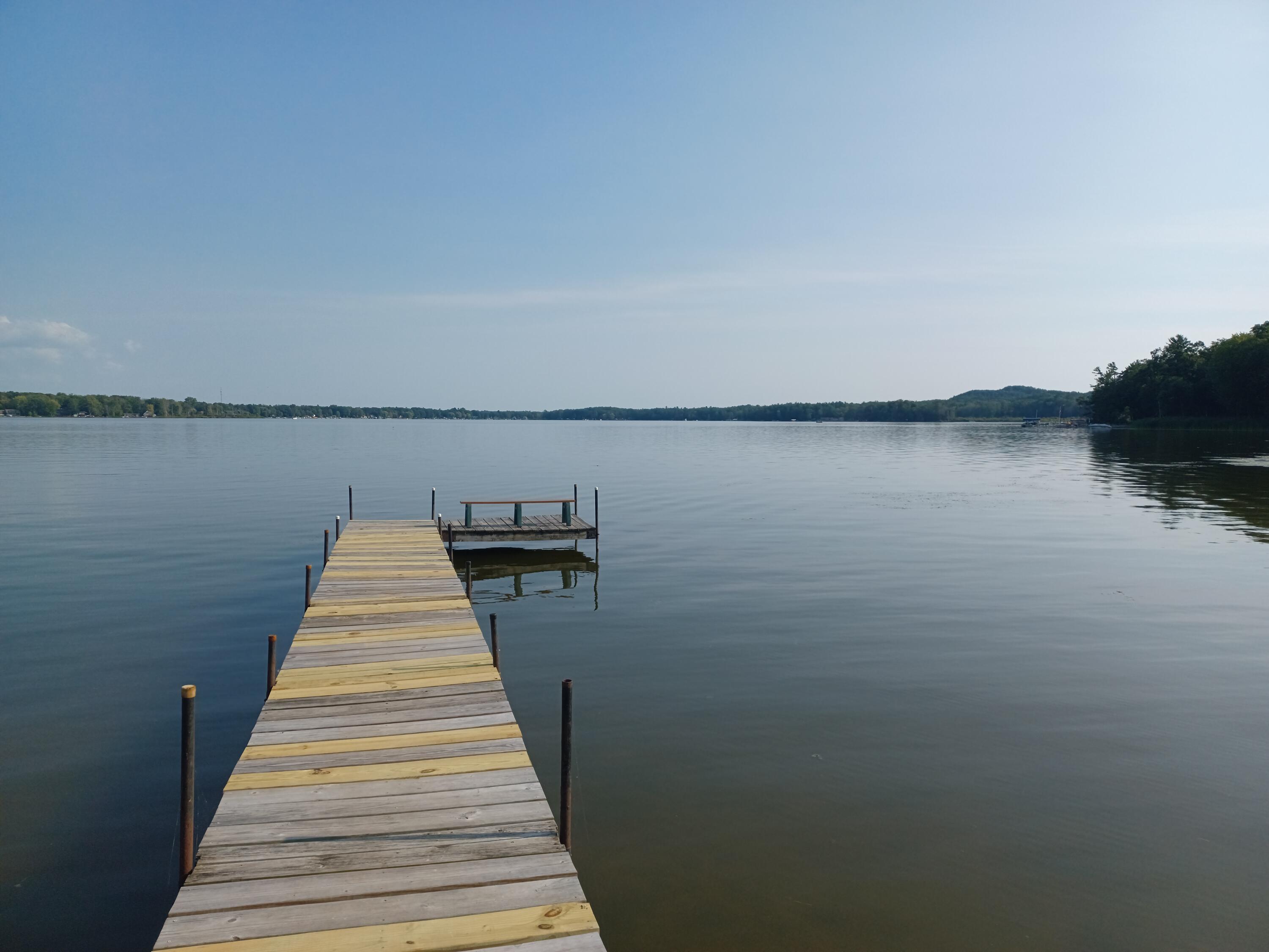 5510 West Lattin Road Pentwater, MI 49449 - Photo 8 of 27 dock and lake