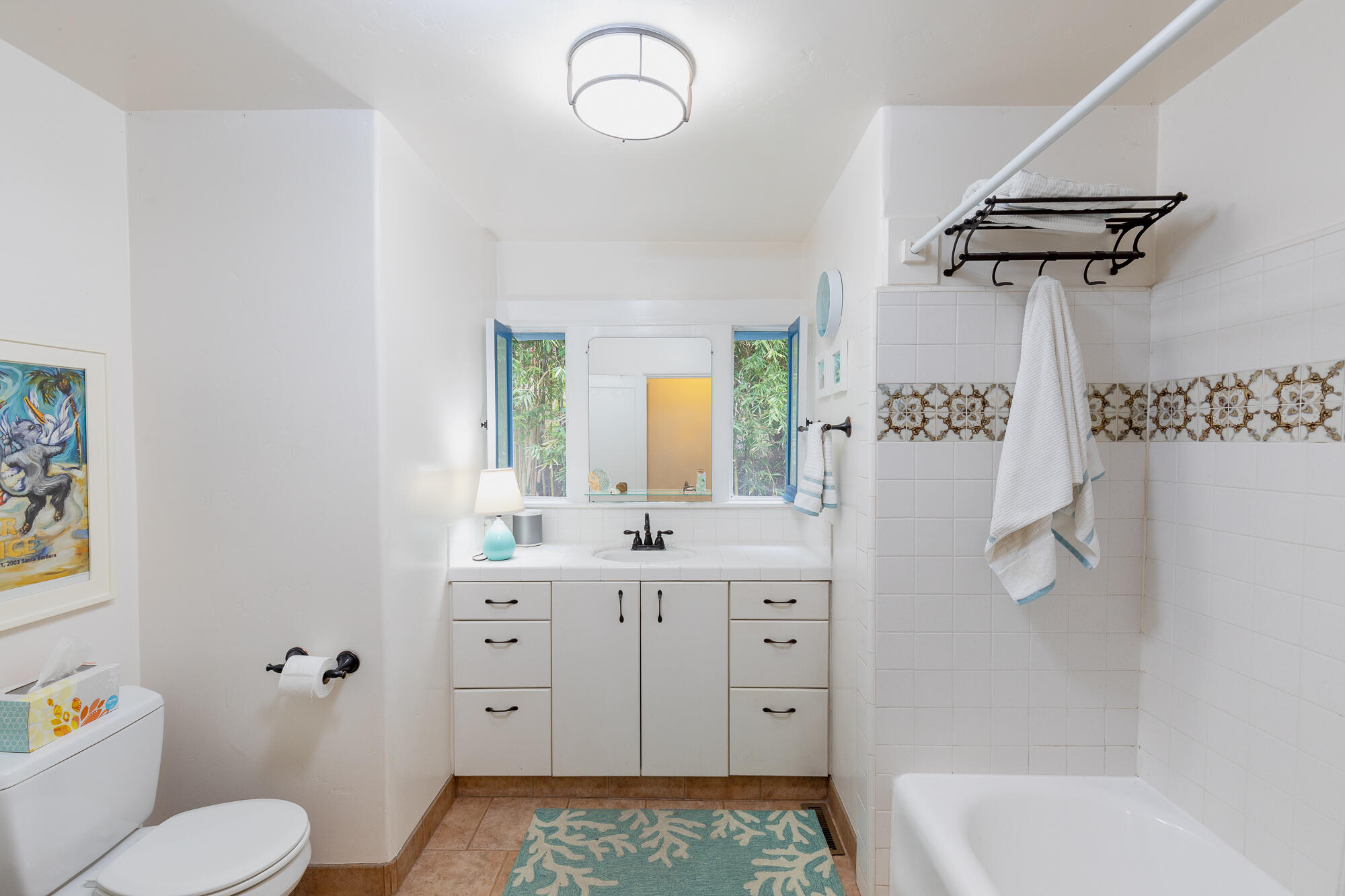 22 Pine Drive Santa Barbara, CA 93105 - Photo 9 of 12 a bathroom with a sink a toilet and shower