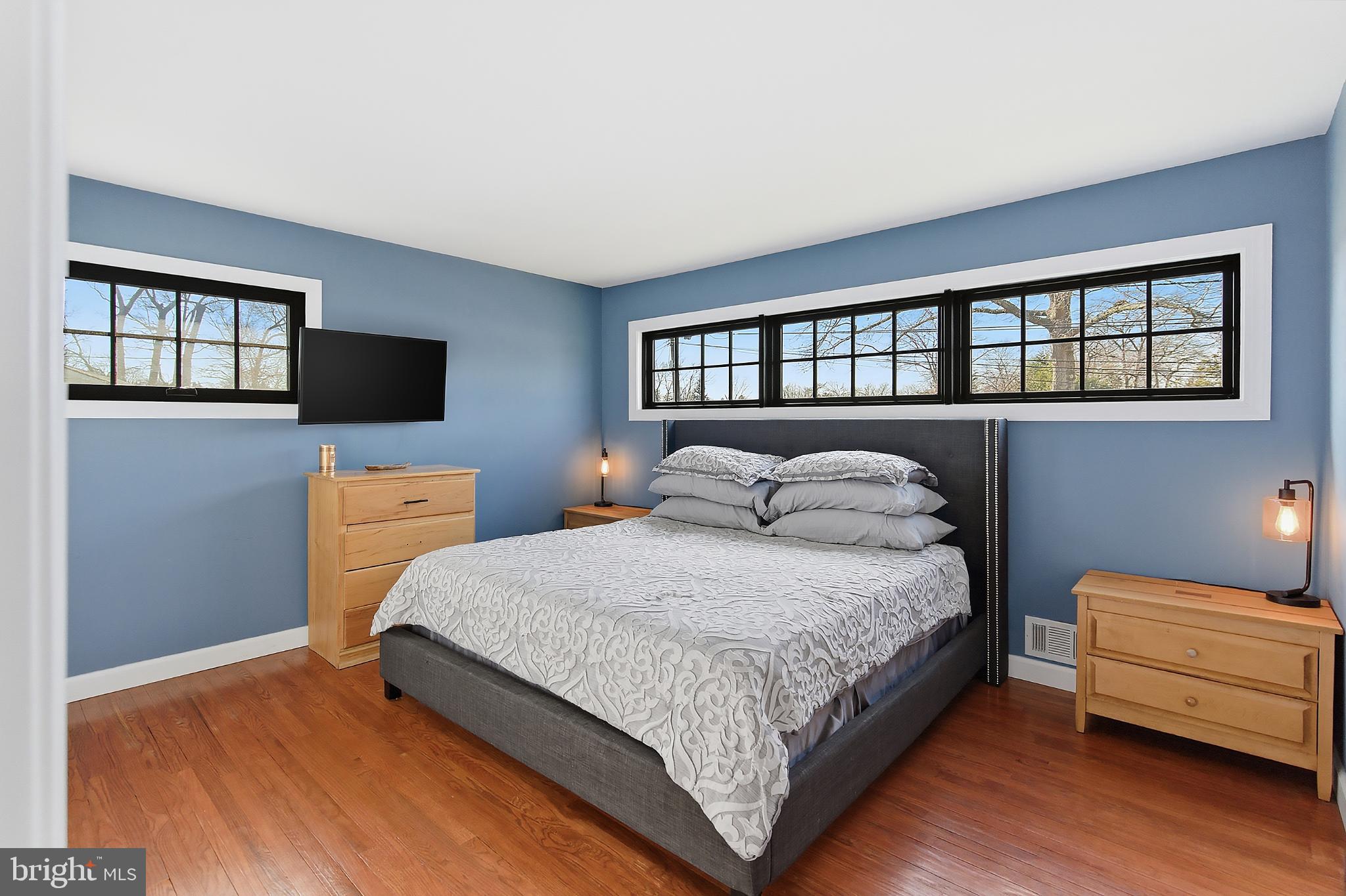 25 Whitman Road Hamilton, NJ 08619 - Photo 13 of 30 Serene bedroom with natural light and charm.