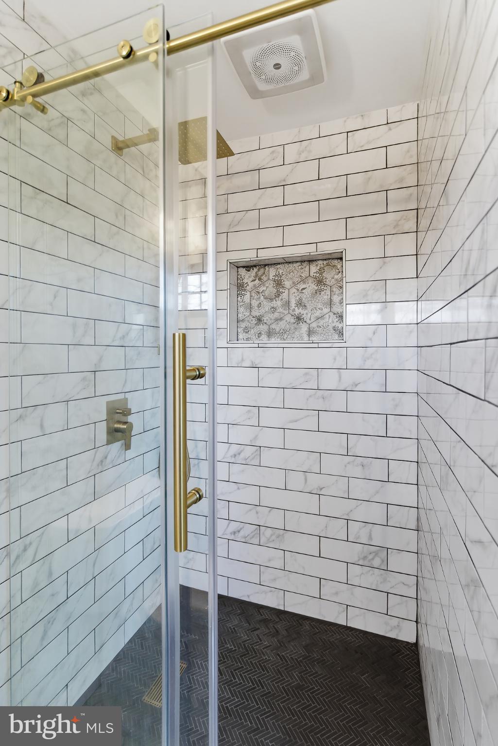 25 Whitman Road Hamilton, NJ 08619 - Photo 16 of 30 Sleek modern shower with elegant tile design.
