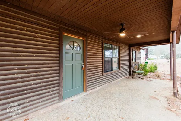 a view of a porch of a house
