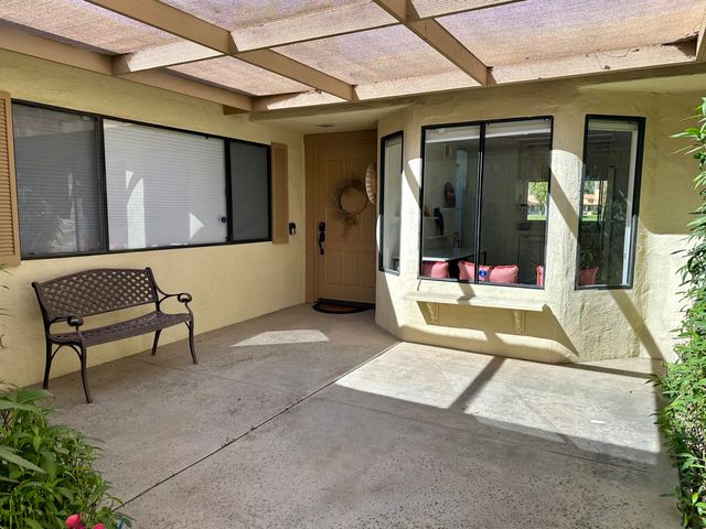 a view of swimming pool with a couch