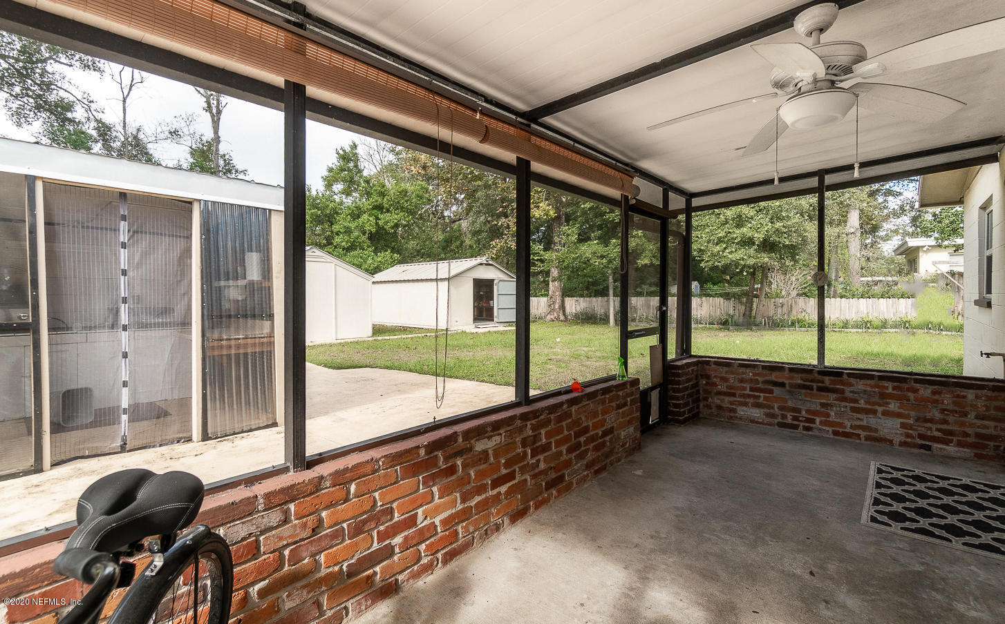 3904 Rogero Road Jacksonville, FL 32277 - Photo 15 of 31 a room with large windows and furniture