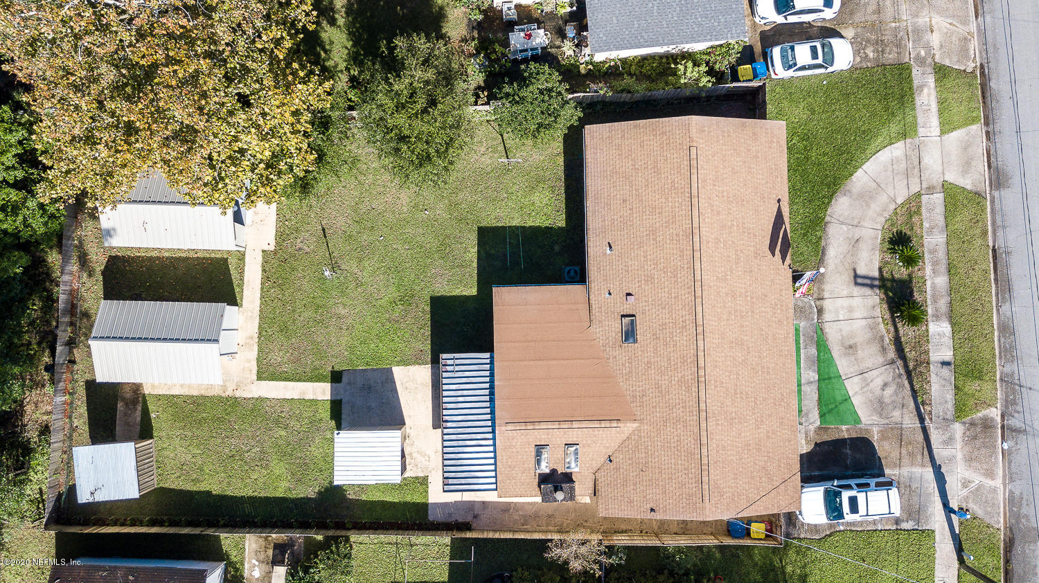 3904 Rogero Road Jacksonville, FL 32277 - Photo 26 of 31 an aerial view of a house with a yard