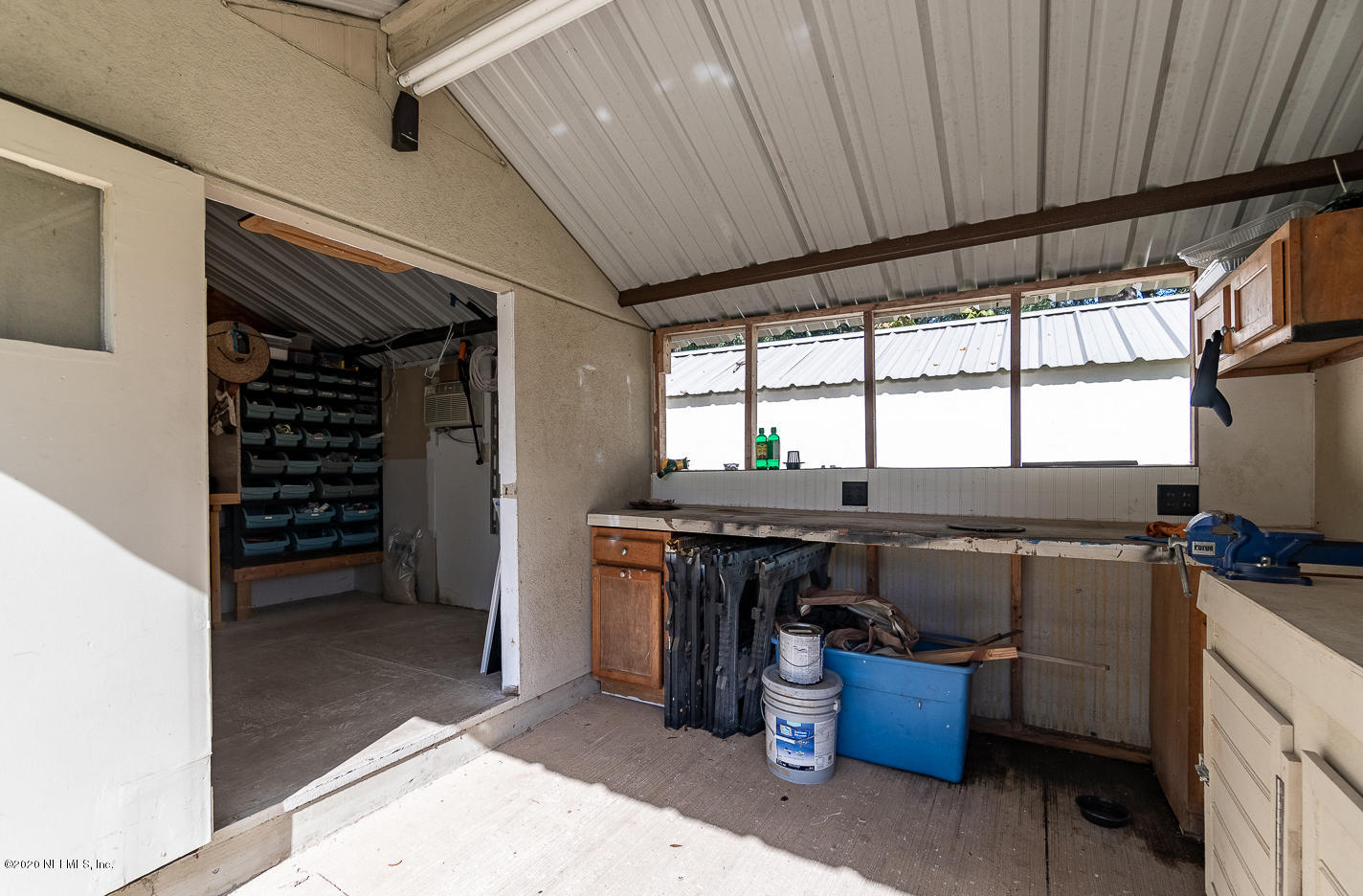 3904 Rogero Road Jacksonville, FL 32277 - Photo 31 of 31 a view of a storage & utility room