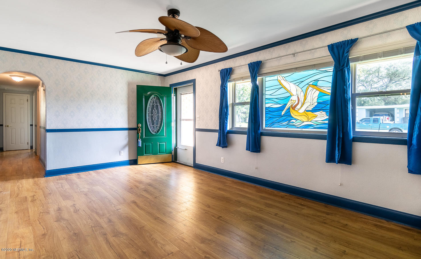 3904 Rogero Road Jacksonville, FL 32277 - Photo 5 of 31 a view of an entryway with wooden floor