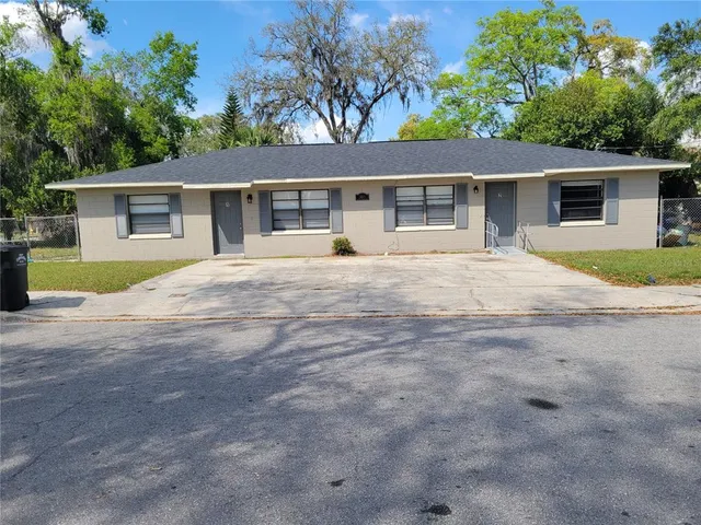 front view of a house with a patio