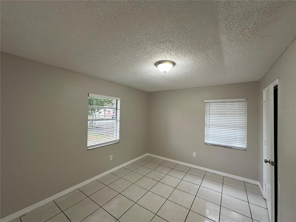 385 Lime Street Maitland, FL 32751 - Photo 9 of 13 a view of an empty room and window