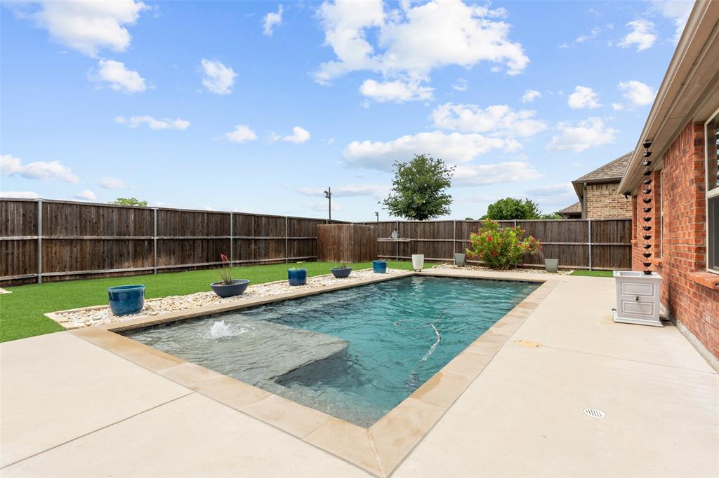 6909 Danridge Road Rowlett, TX 75089 - Photo 23 of 29 a view of a garden