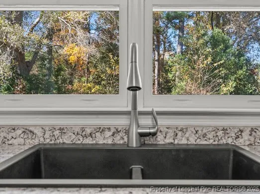 a view of a utility room with a window