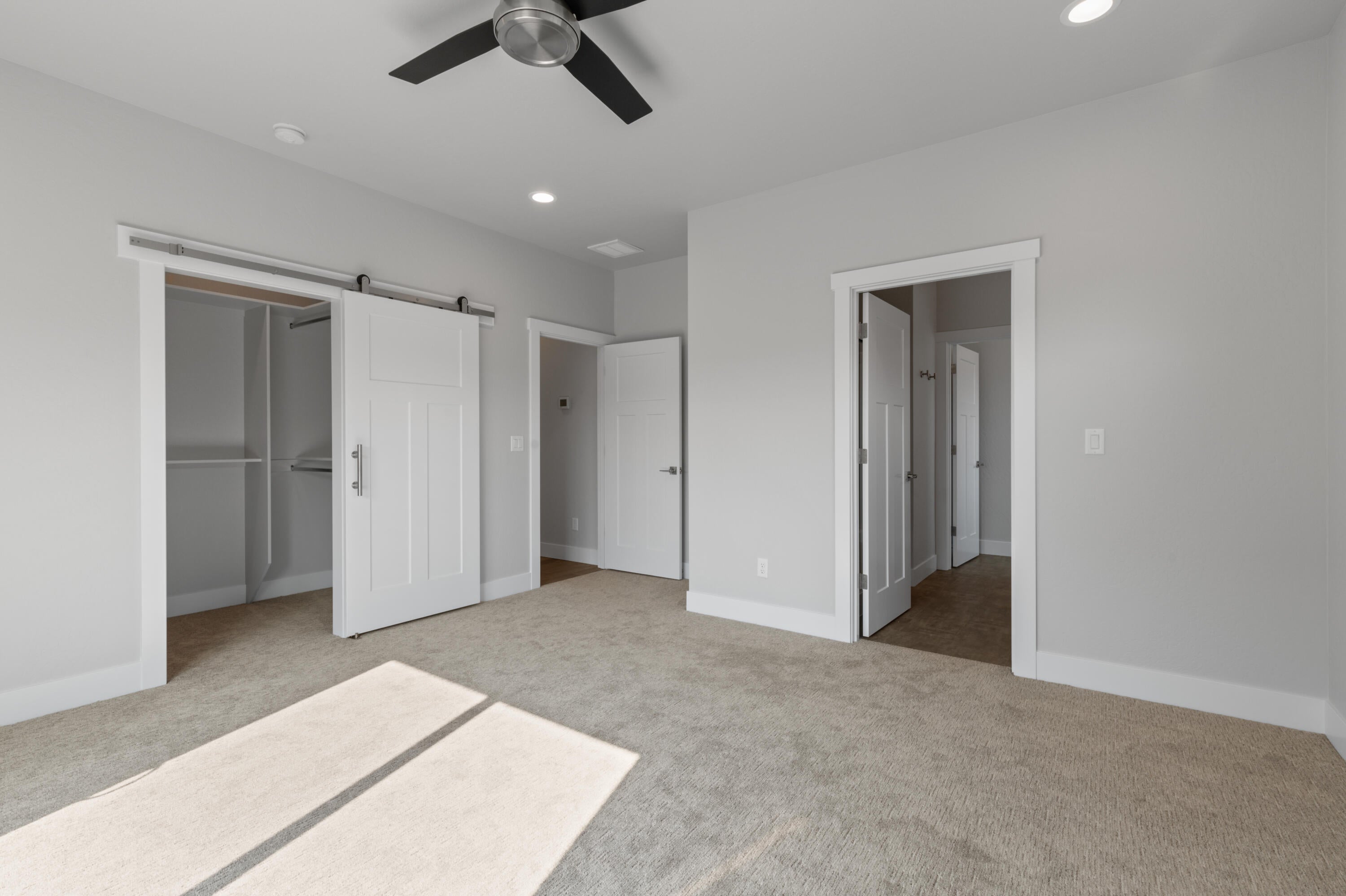 220 Autumn Ridge Road Talent, OR 97540 - Photo 14 of 27 Barn door closure to walk-in closet and door to master bath.