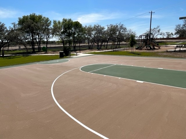 336 Ridgewell Loop Georgetown, TX 78633 - Photo 26 of 31 a view of a basket ball ground