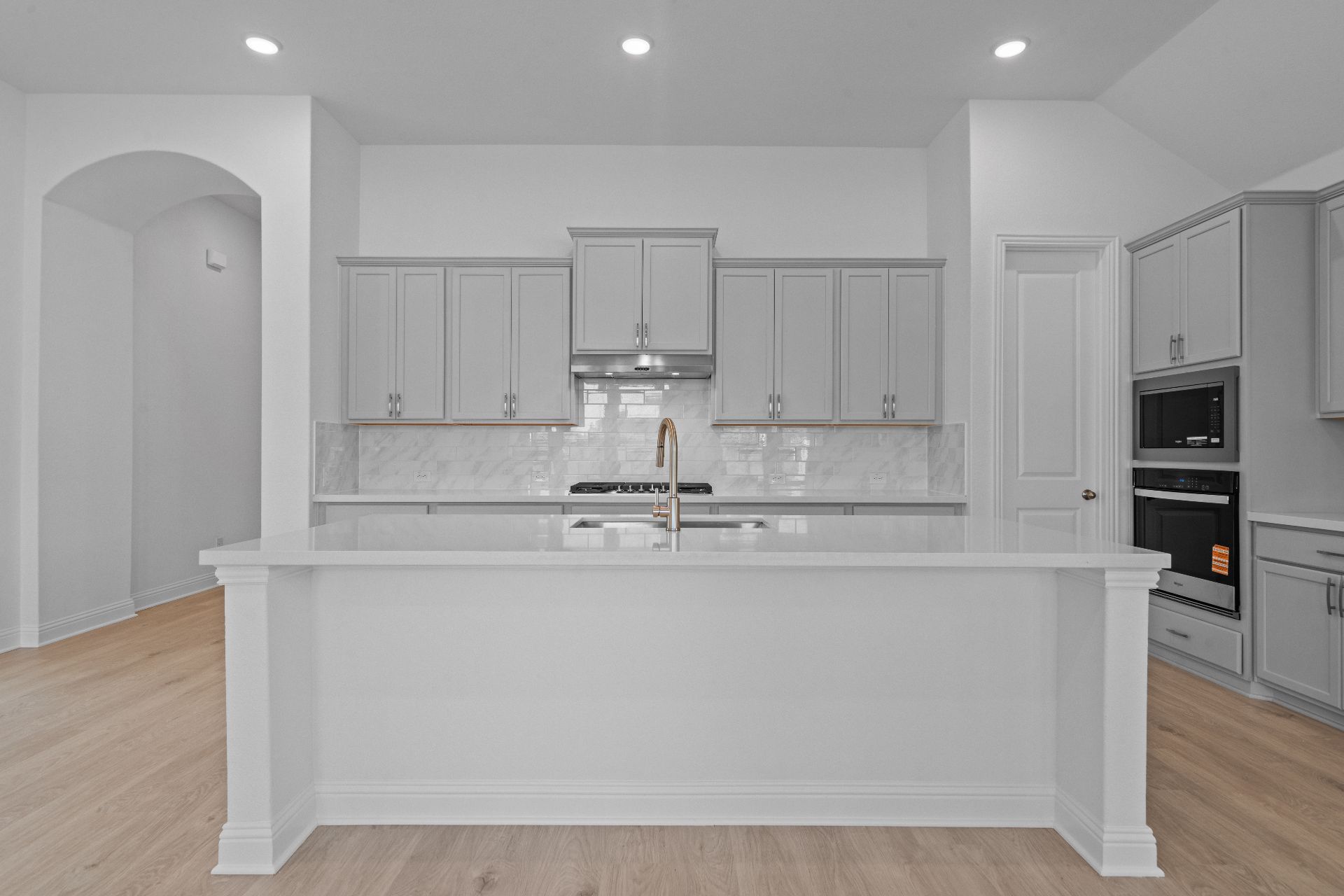 336 Ridgewell Loop Georgetown, TX 78633 - Photo 6 of 31 a kitchen with kitchen island stainless steel appliances a sink and cabinets
