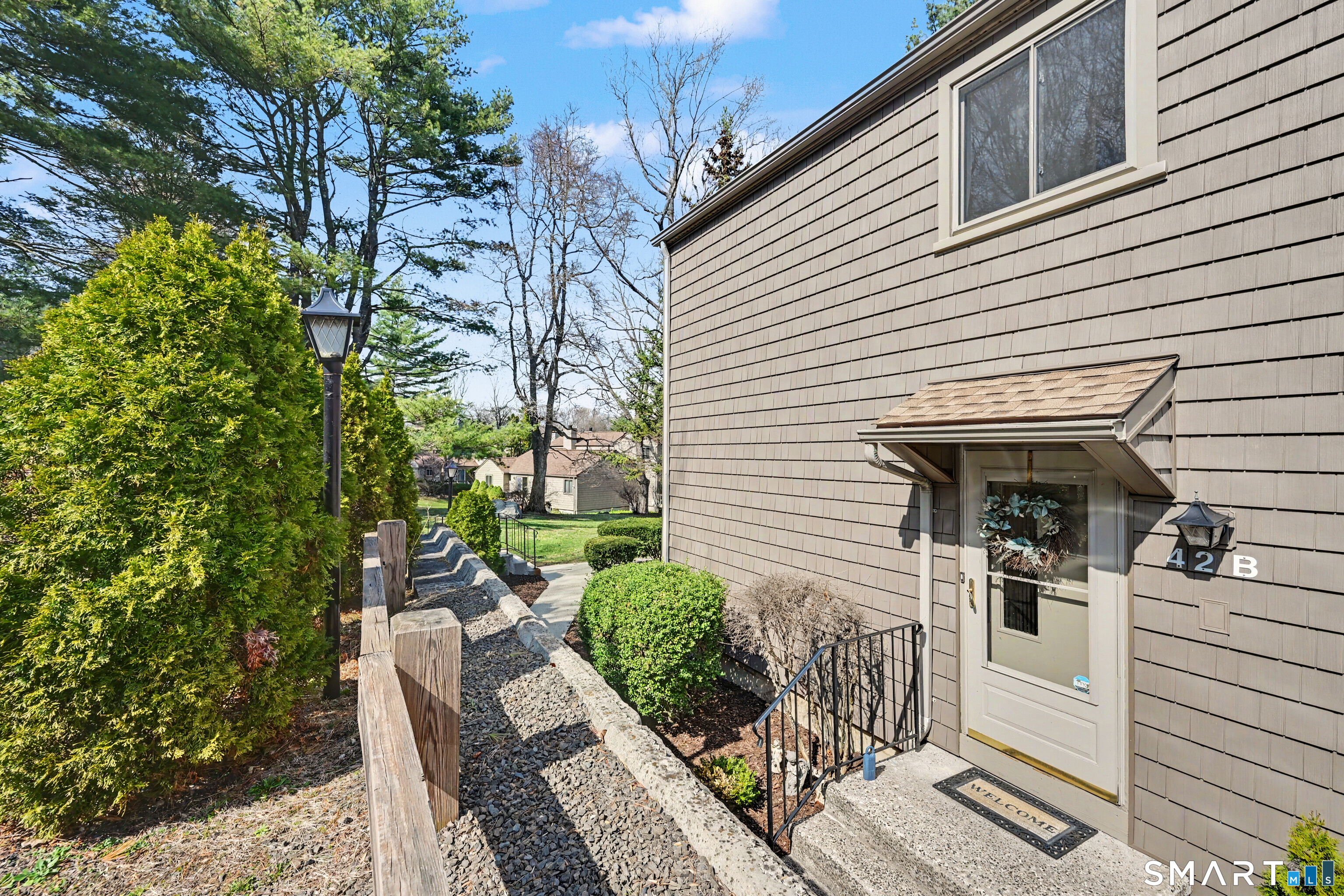 42 Powder Mill Road, Unit B Stratford, CT 06614 - Photo 2 of 40 Front view of the townhome