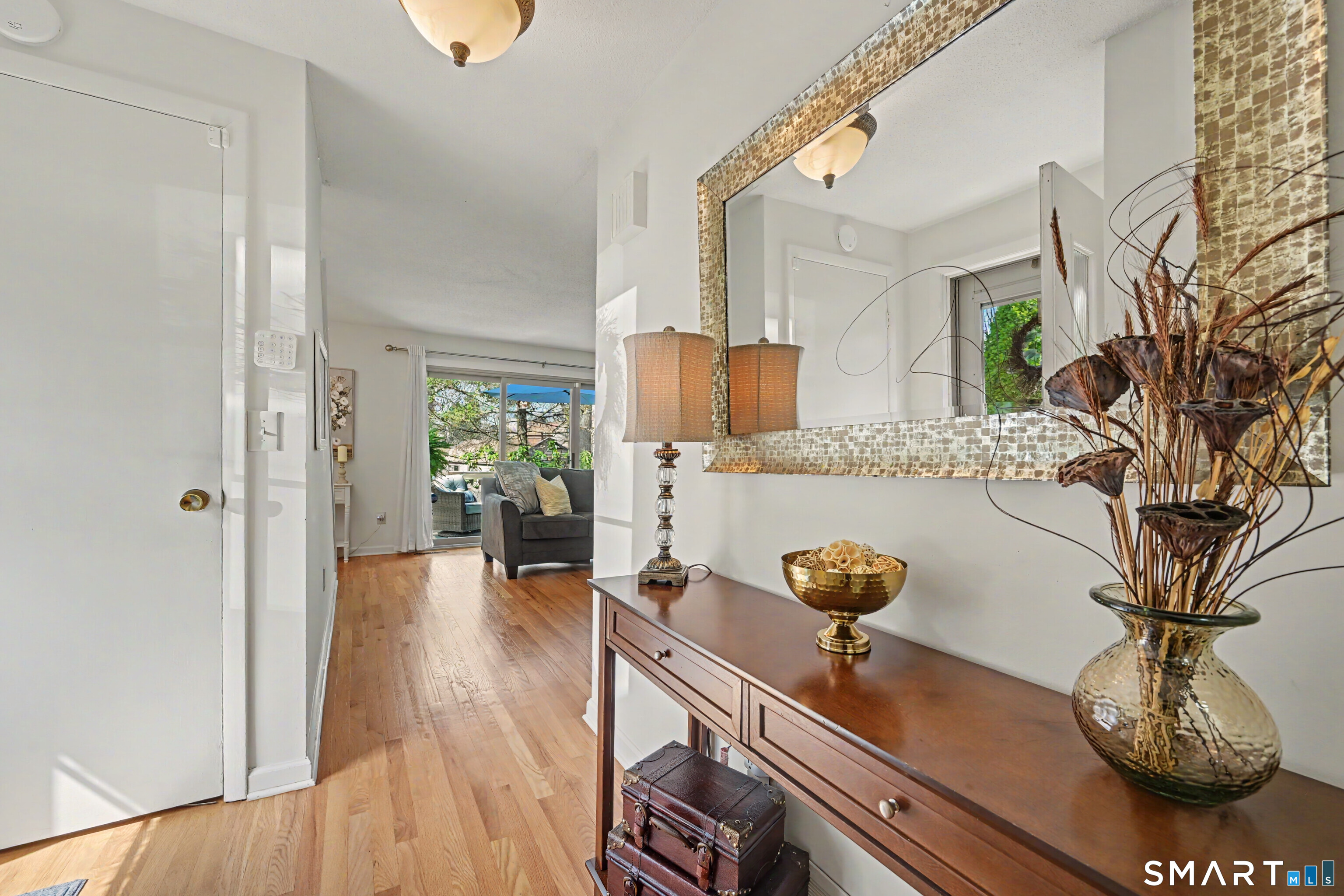 42 Powder Mill Road, Unit B Stratford, CT 06614 - Photo 4 of 40 Foyer looking into the living room